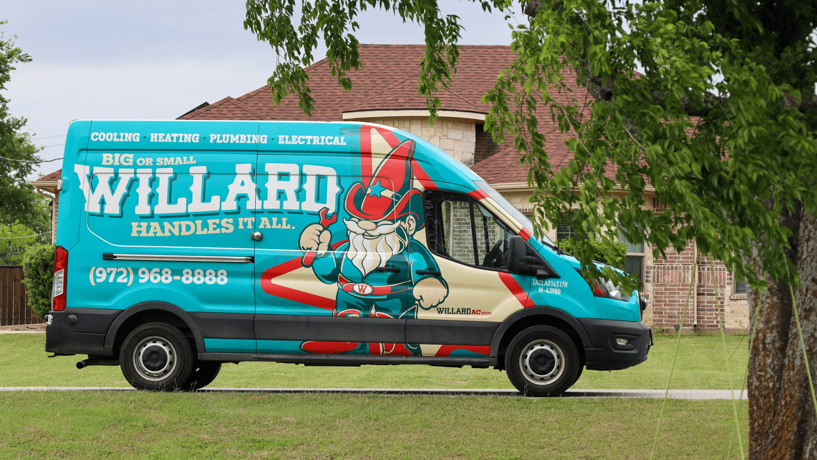 Willard service van parked outside a home for drain cleaning service