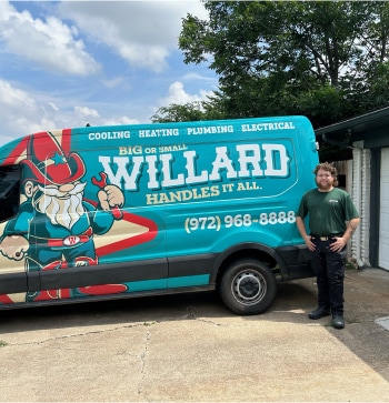 A Willard service van with a gnome and a technician standing beside it.