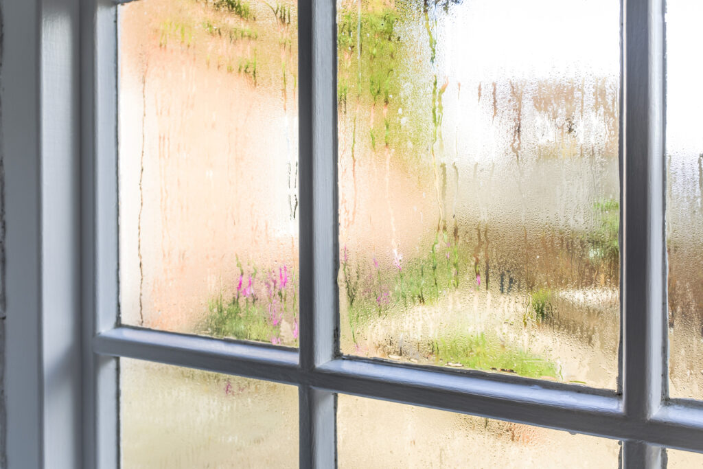 Condensation on an old window due to high humidity in the home