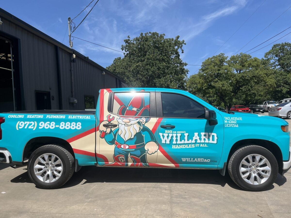 Willard Plumbing and Drain Cleaning Truck in Fort Worth, TX Willard branded service truck parked outside a company building in Fort Worth, TX